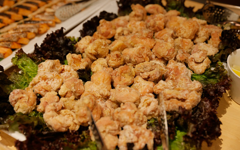 Karaage, or Japanese fried chicken, on a plate with lettuce