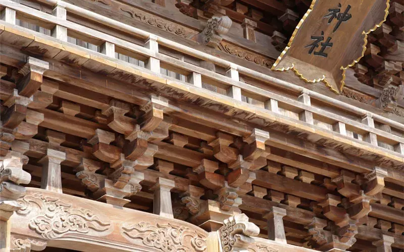 Closeup of woodwork of a Japanese shrine