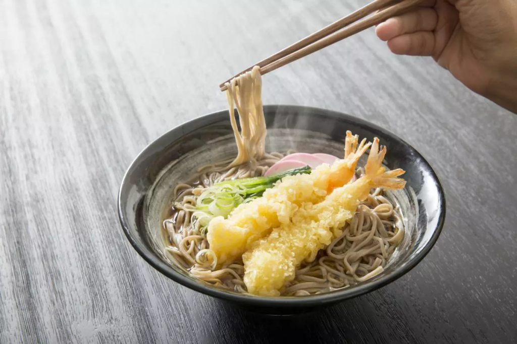 Bowl of tempura soba representing Japanese New Year food traditions